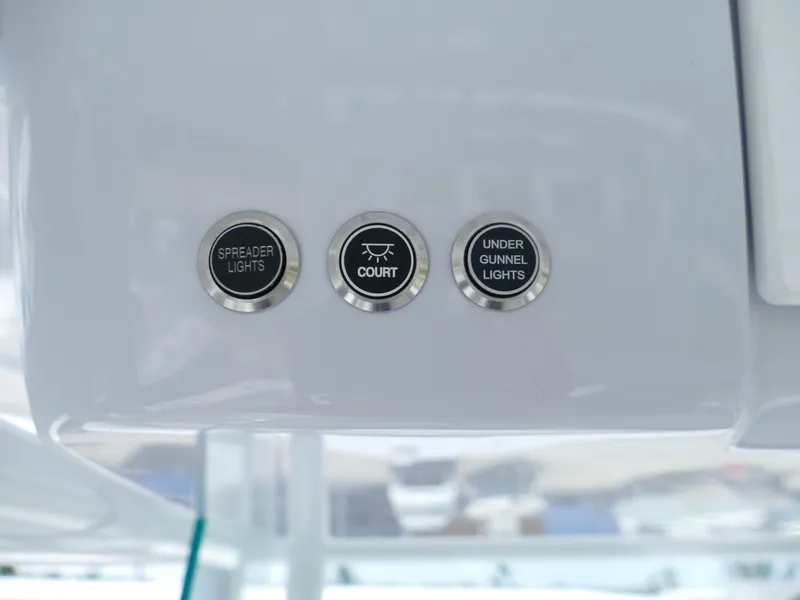 Slide: The Image of 2024 Cape Horn 31T Tournament boat light control buttons. - 24