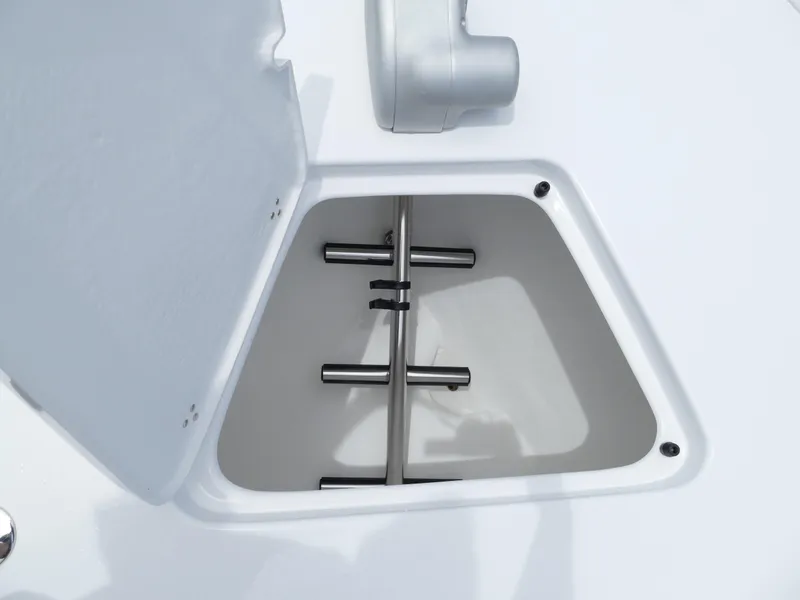 Slide: The Image of Open storage compartment on 2024 Cape Horn 31T Tournament boat. - 33