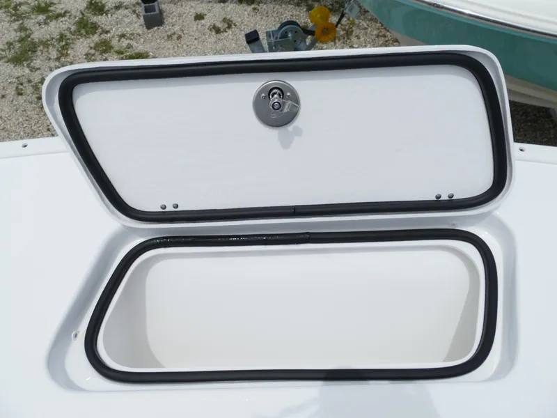 Slide: The Image of 2024 Cape Horn 31T Tournament storage compartment with open hatch. - 35