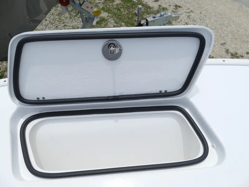 Slide: The Image of Open storage compartment on a 2024 Cape Horn 31T Tournament boat. - 37