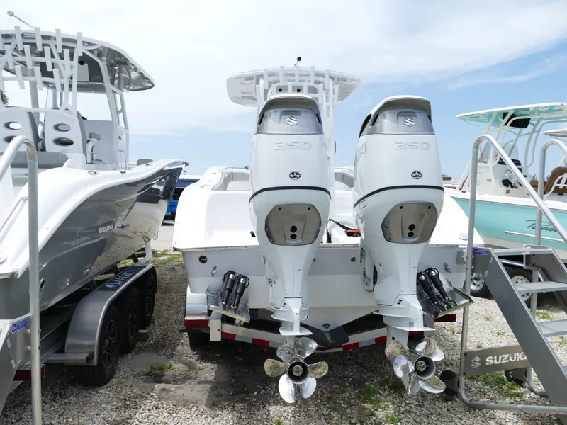 Slide: The Image of 2024 Cape Horn 31T Tournament boat with twin Suzuki 350 outboard engines. - 6