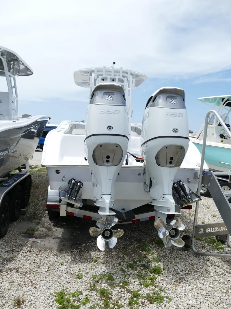 Slide: The Image of 2024 Cape Horn 31T Tournament boat with dual Suzuki 350 outboard engines. - 7
