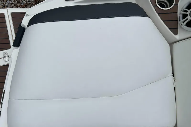 Slide: The Image of 2011 Regal 2500 Bowrider white and black seat cushion. - 12