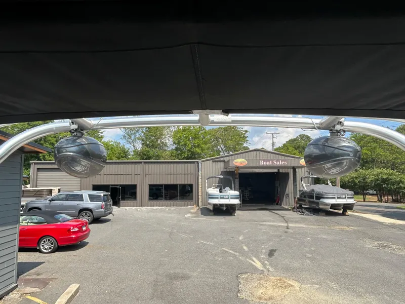 Slide: The Image of 2011 Regal 2500 Bowrider at boat sales dealership parking lot. - 30