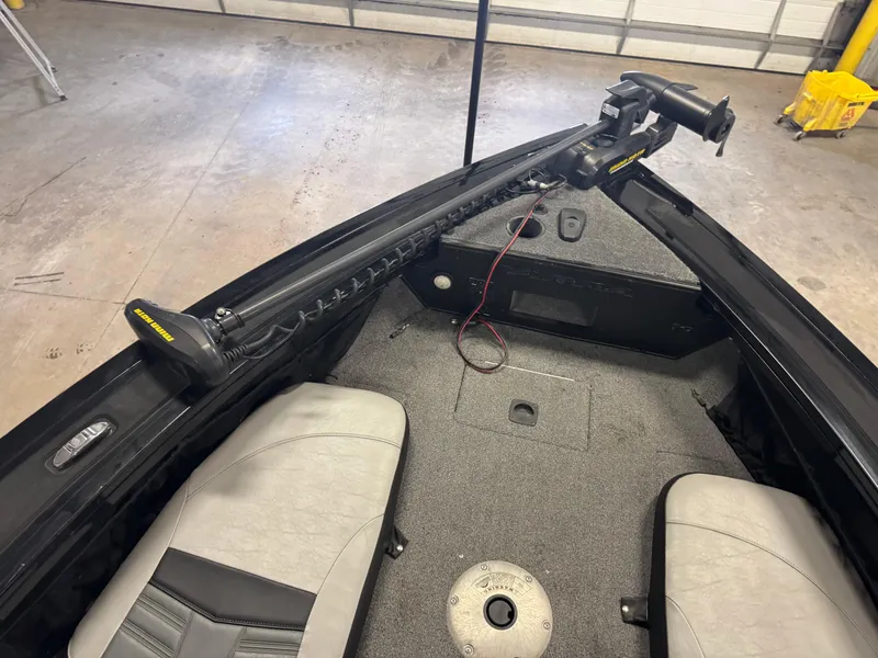 Slide: The Image of Minn Kota trolling motor on 2018 Tracker Targa V-19 WT boat in garage. - 10