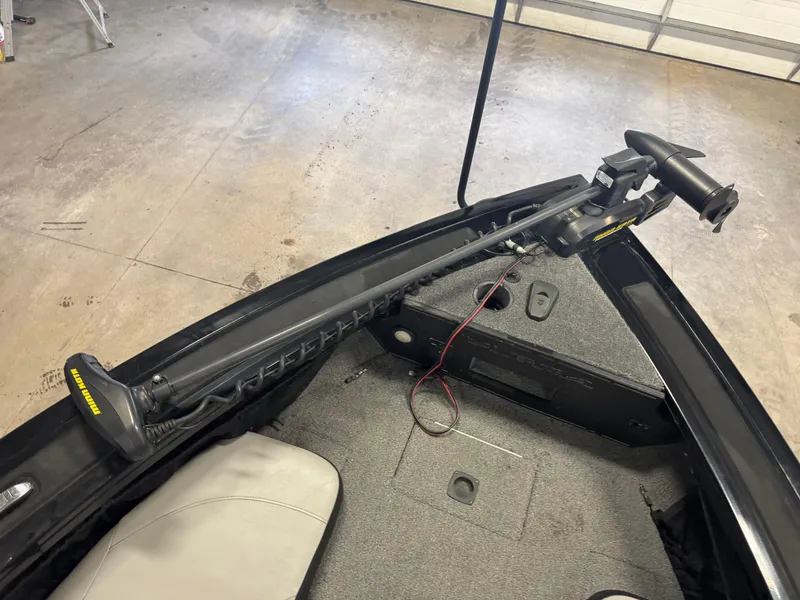 Slide: The Image of 2018 Tracker Targa V-19 WT boat interior with two cushioned seats. - 12