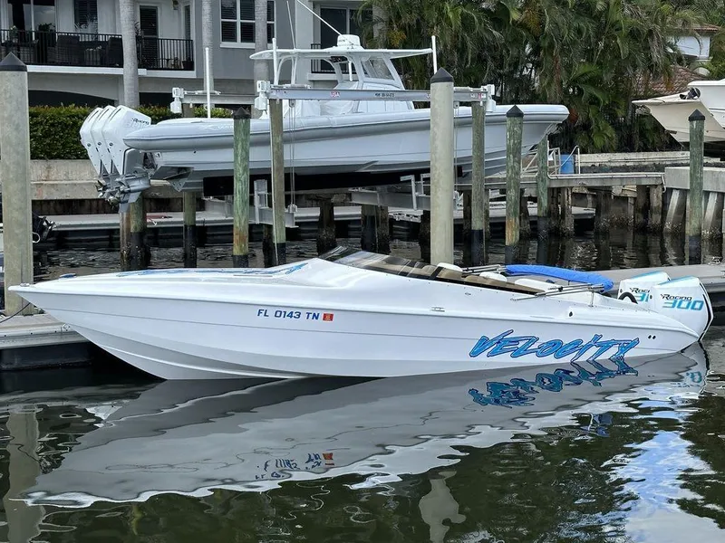 Slide: The Image of 2024 Velocity 290sc speedboat docked in marina. - 3