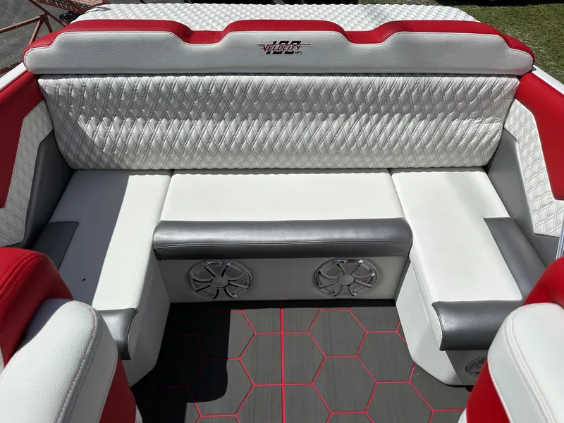 Slide: The Image of Luxurious interior of 2025 Velocity 290 SC boat with red and white seating. - 25