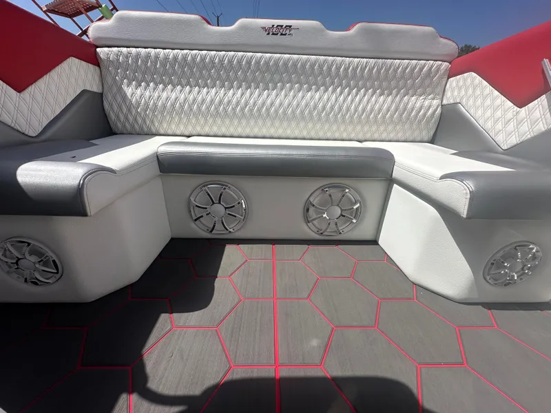 Slide: The Image of Luxury interior of 2025 Velocity 290 SC boat with stylish seating and speakers. - 27