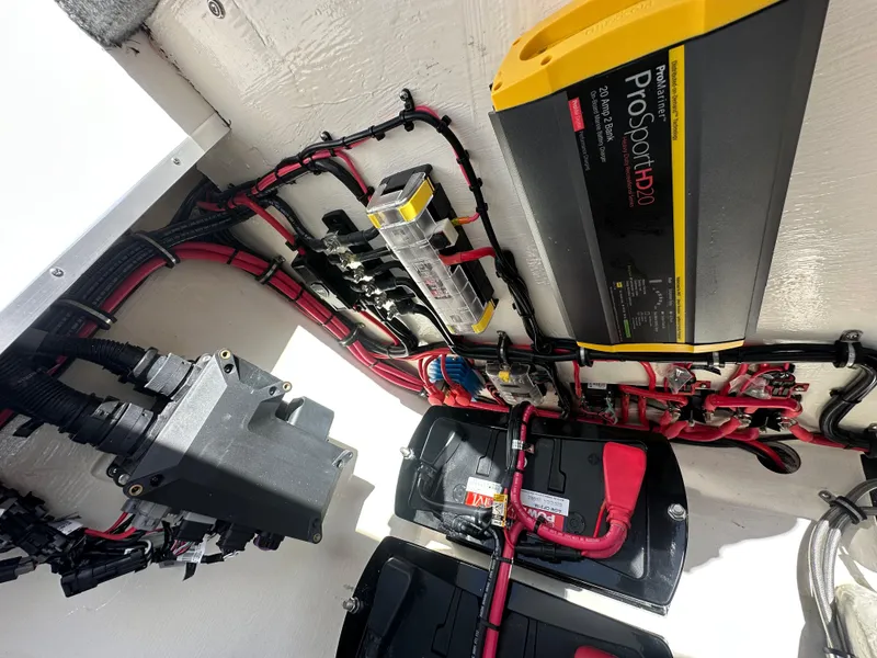Slide: The Image of Electrical system of a 2025 Velocity 290 SC boat, featuring ProSport HD20 charger. - 33