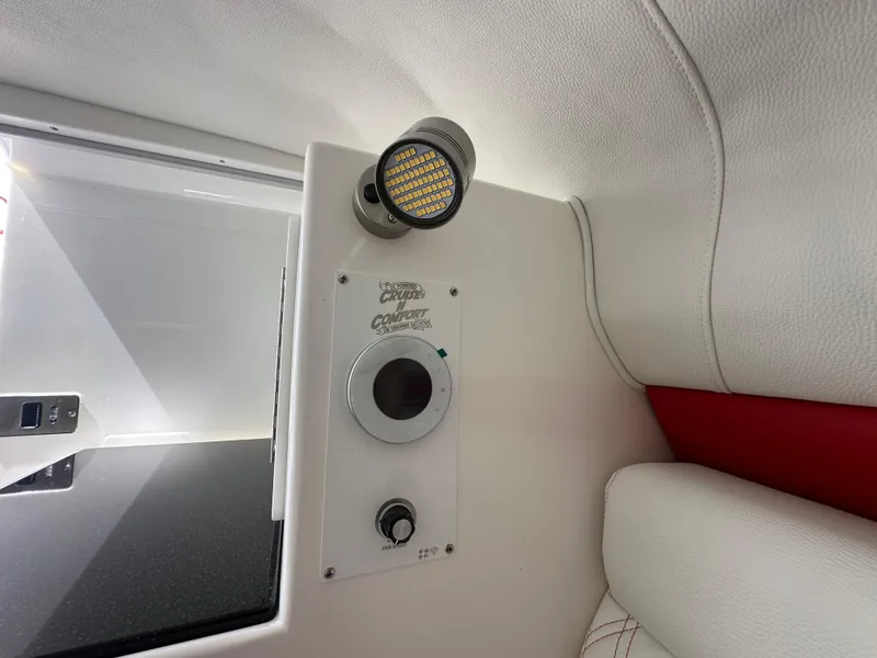 Slide: The Image of Interior of 2025 Velocity 290 SC boat with control panel and LED light. - 40