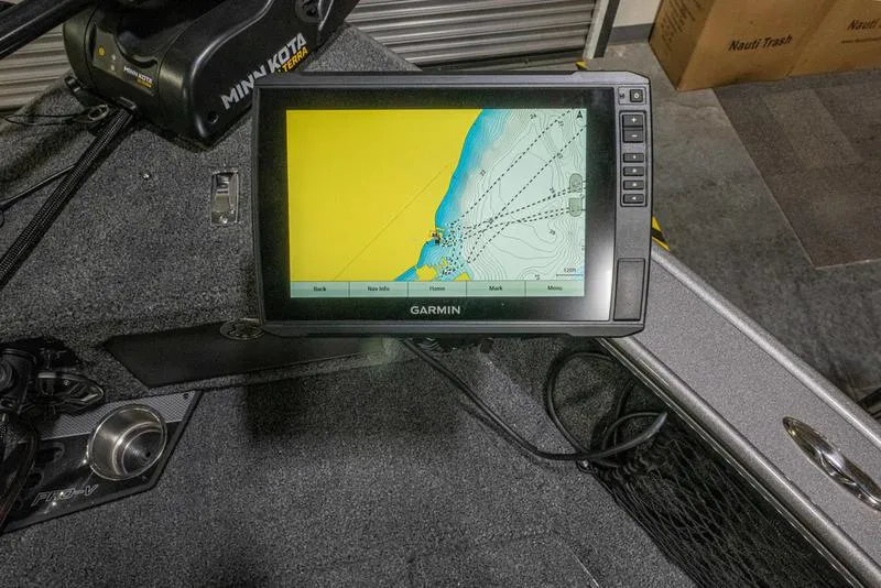 Slide: The Image of Garmin fishfinder on 2024 Lund 1875 Pro V Sport boat with Minn Kota trolling motor. - 14