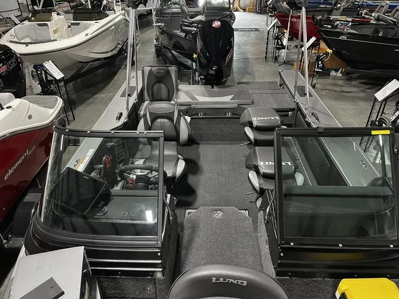 Slide: The Image of 2024 Lund 1875 Pro V Sport fishing boat interior, showroom display. - 6
