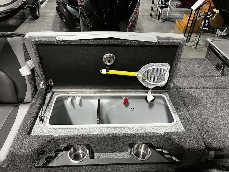 Slide: The Image of 2024 Lund 1875 Pro V Sport livewell with net and cup holders. - 7