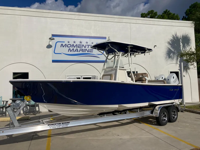 The Image of 2024 Sea Born LX24 boat on trailer at Moment Marine dealership. - 0