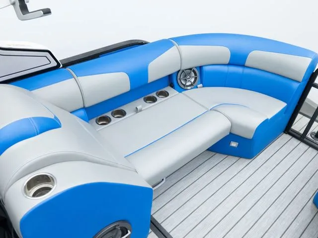 Slide: The Image of Luxurious blue and gray seating in Montara 25' SURF BOSS 2.0 CW boat. - 11