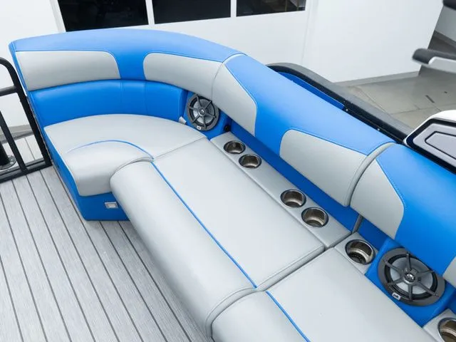 Slide: The Image of Luxurious blue and gray seating in Montara 25' SURF BOSS 2.0 CW boat. - 12