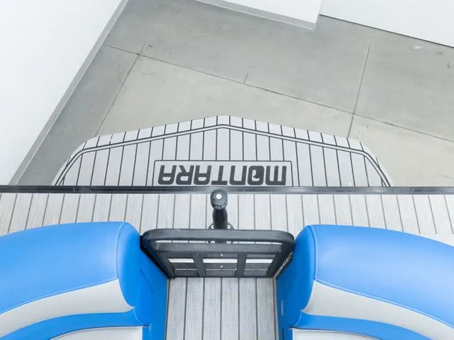 Slide: The Image of Interior view of Montara 25' SURF BOSS 2.0 CW 2023 with blue seats. - 13