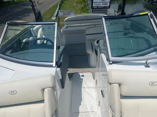Slide: The Image of 2021 Cobalt R5 boat interior with white seating and open windshield. - 11
