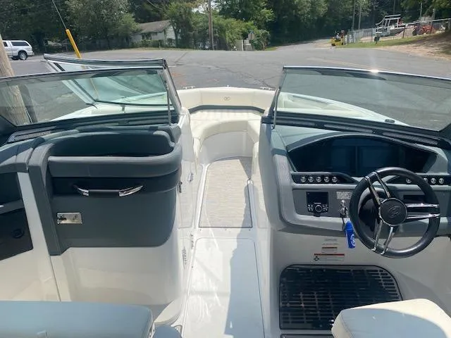 Slide: The Image of 2021 Cobalt R5 boat interior with dual consoles and steering wheel. - 14