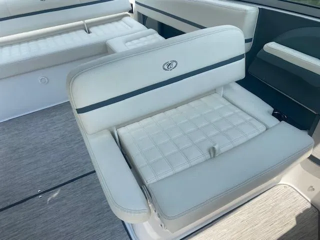Slide: The Image of 2021 Cobalt R5 boat interior with white cushioned seating. - 18