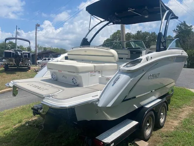 Slide: The Image of 2021 Cobalt R5 boat on a trailer, rear view with seating and swim platform. - 4