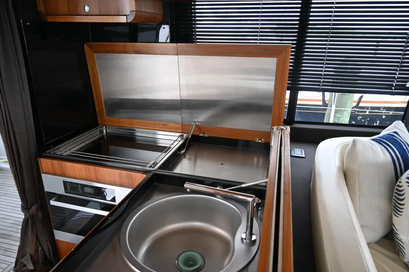 Slide: The Image of Modern kitchen area in 2014 Azimut Magellano 50 yacht with sink and stove. - 17