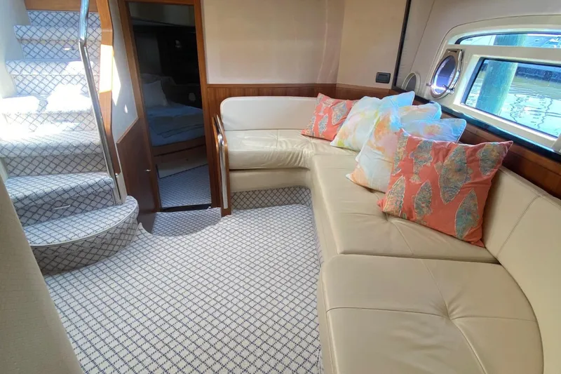 Slide: The Image of Luxurious interior of 2014 Azimut Magellano 50 yacht with plush seating and decorative pillows. - 26