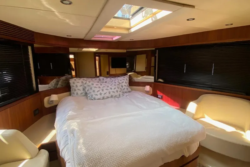 Slide: The Image of Luxurious bedroom interior of 2014 Azimut Magellano 50 yacht with skylight and elegant furnishings. - 29