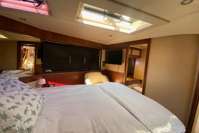 Slide: The Image of Luxurious bedroom interior of 2014 Azimut Magellano 50 yacht with skylight and modern decor. - 30