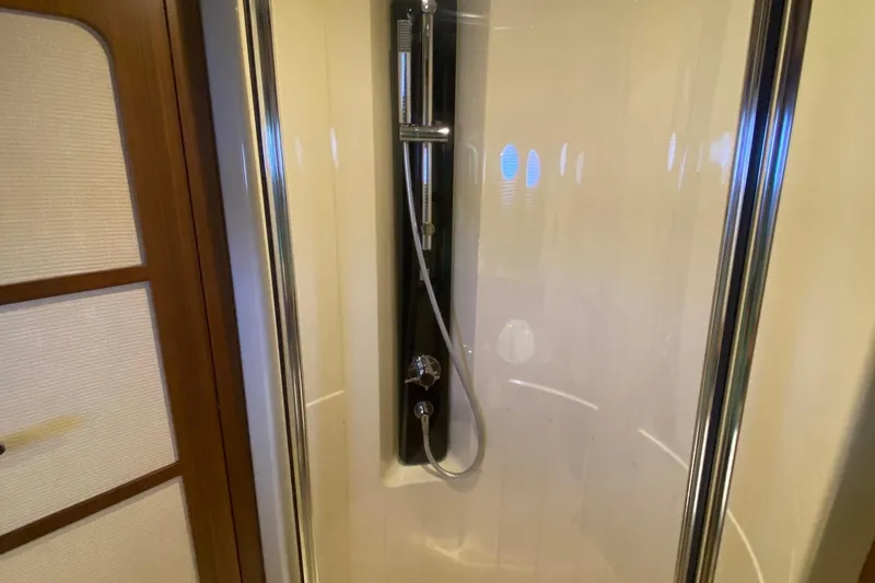 Slide: The Image of Shower area in 2014 Azimut Magellano 50 yacht, featuring modern fixtures. - 33