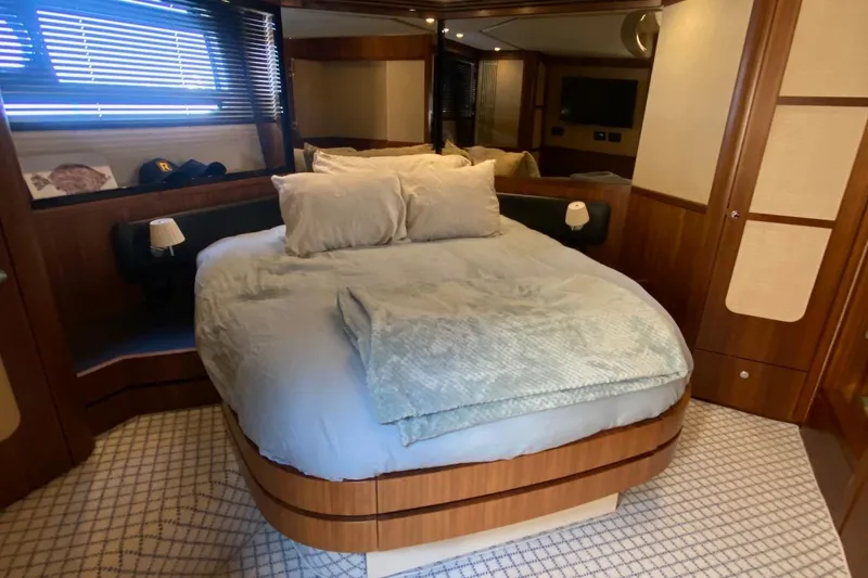 Slide: The Image of Luxurious bedroom interior of 2014 Azimut Magellano 50 yacht with cozy bedding. - 34