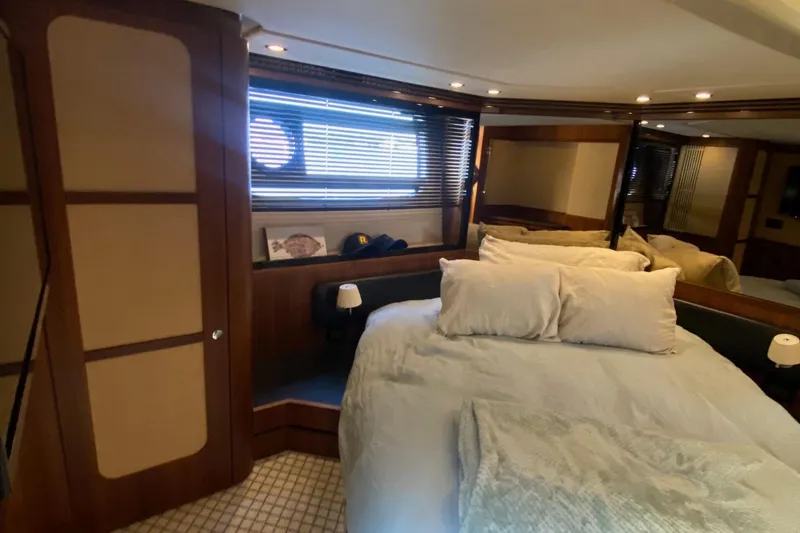 Slide: The Image of Luxurious bedroom interior of 2014 Azimut Magellano 50 yacht with cozy bedding. - 36