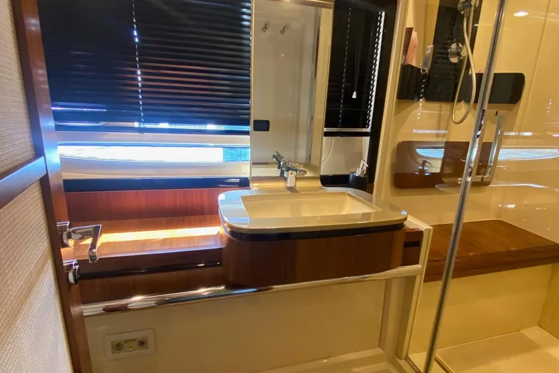 Slide: The Image of Luxurious bathroom in 2014 Azimut Magellano 50 yacht with modern fixtures and elegant design. - 39