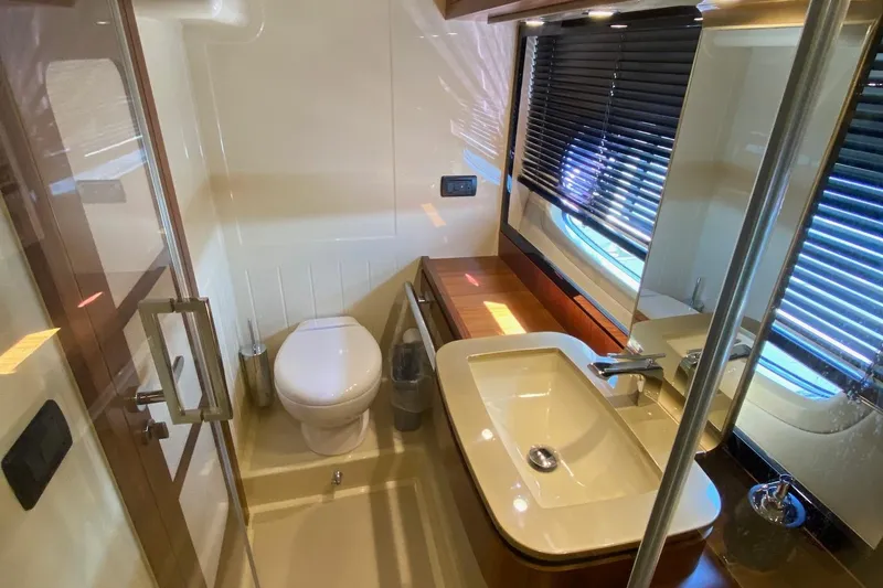 Slide: The Image of Luxurious bathroom in 2014 Azimut Magellano 50 yacht with modern fixtures and sleek design. - 40