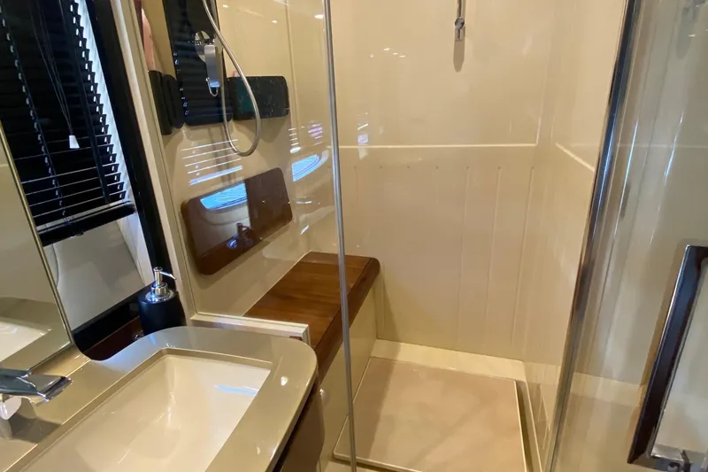Slide: The Image of Luxurious bathroom in 2014 Azimut Magellano 50 yacht with modern shower and sink. - 41