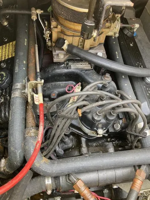 Slide: The Image of Engine compartment of a 1990 Bayliner 3288 Motoryacht showing various components and wiring. - 14