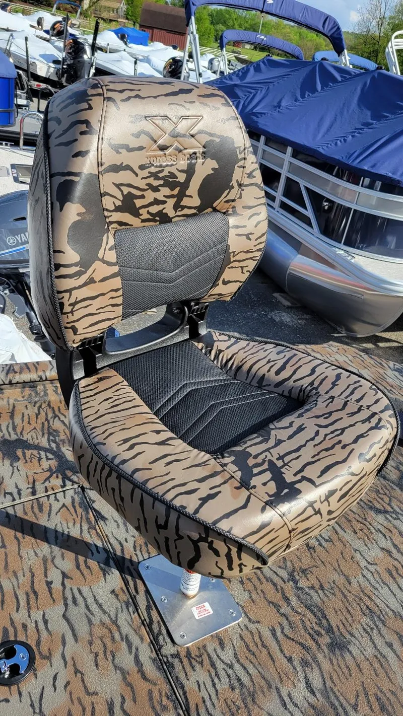Slide: The Image of Camouflage-patterned boat seat on 2025 Xpress XP18CC with Yamaha 70 hp engine. - 5