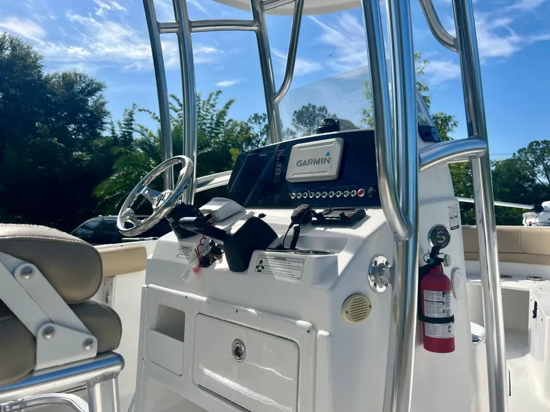 Slide: The Image of 2015 Sportsman 232 boat console with Garmin GPS and fire extinguisher. - 15