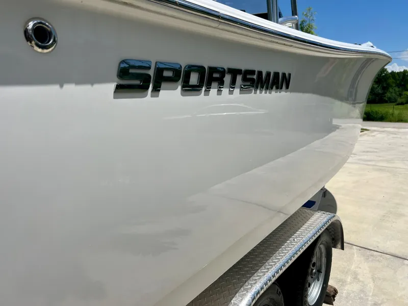 Slide: The Image of 2015 Sportsman 232 boat side view on trailer. - 24