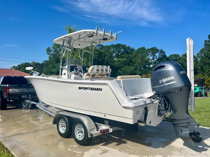 Slide: The Image of 2015 Sportsman 232 boat on trailer with Yamaha outboard motor. - 25