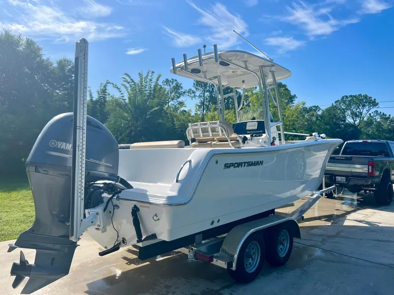 Slide: The Image of 2015 Sportsman 232 boat on trailer with Yamaha outboard motor. - 26