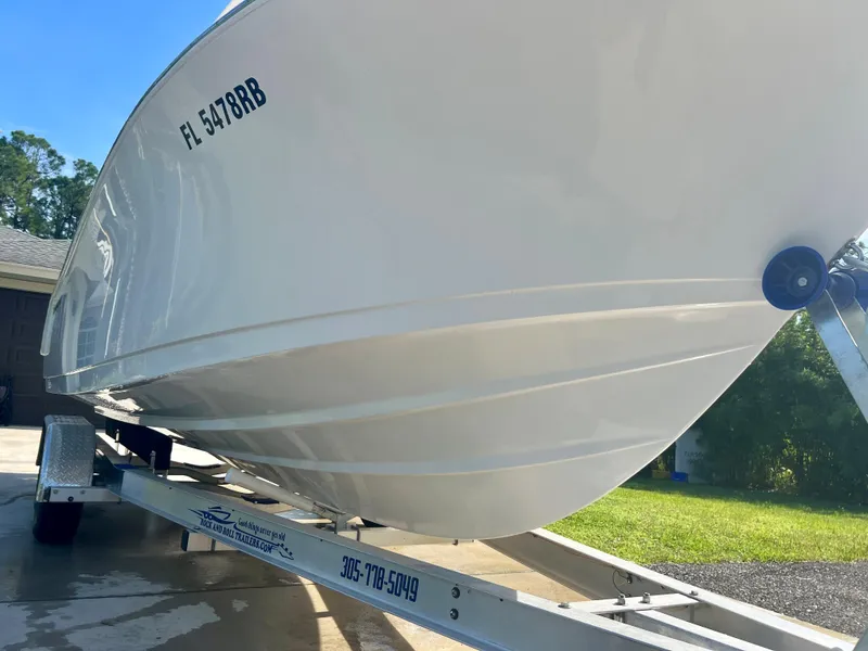 Slide: The Image of 2015 Sportsman 232 boat on trailer, side view, registration FL 5478 RB. - 7