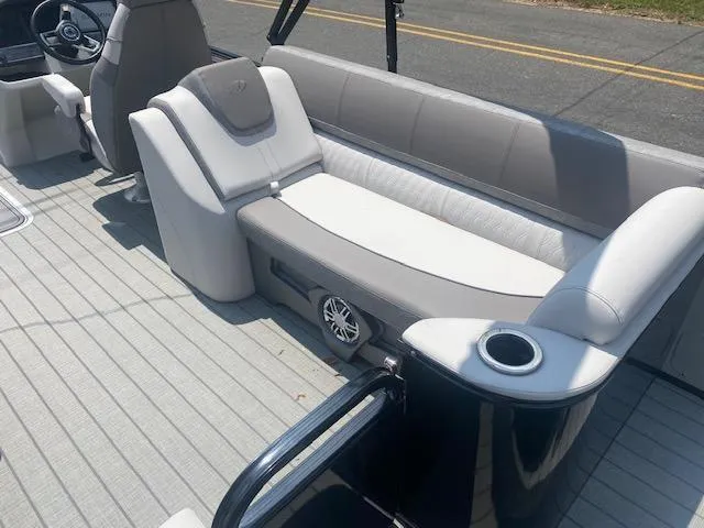 Slide: The Image of 2023 Avalon Catalina 2385 Quad Lounger interior with plush seating and modern design. - 15