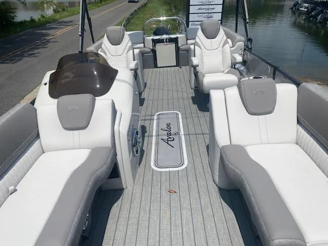 Slide: The Image of 2023 Avalon Catalina 2385 Quad Lounger pontoon boat with luxurious seating and modern design. - 21