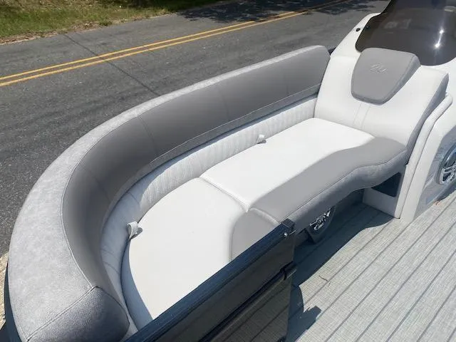 Slide: The Image of 2023 Avalon Catalina 2385 Quad Lounger boat with spacious seating area. - 22