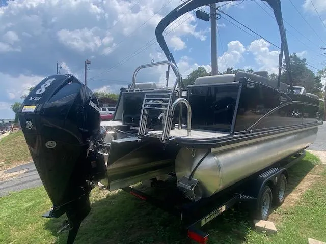 Slide: The Image of 2023 Avalon Catalina 2385 Quad Lounger pontoon boat with Mercury 200 V6 engine. - 4