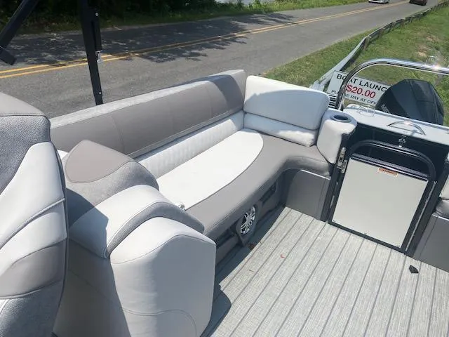Slide: The Image of 2023 Avalon Catalina 2385 Quad Lounger interior with comfortable seating. - 9