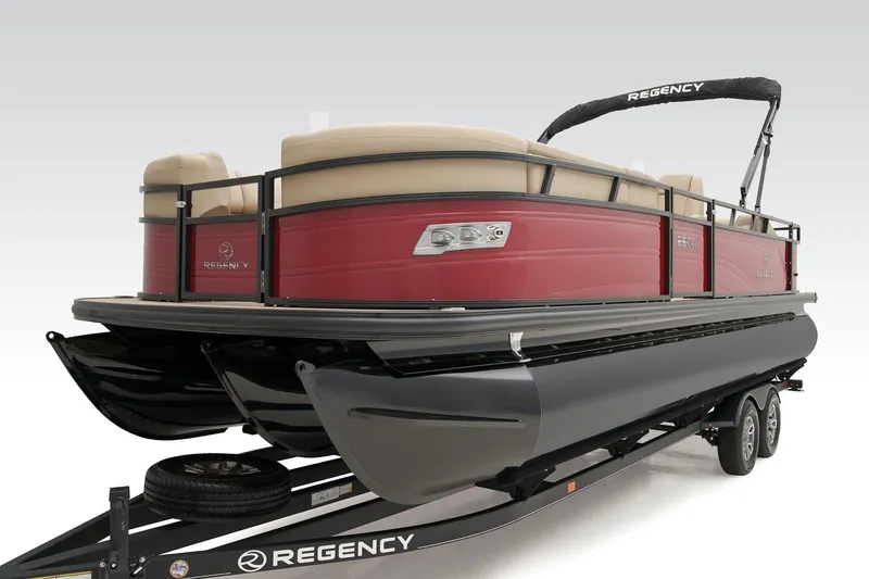 Slide: The Image of 2024 Regency 250 DL3 pontoon boat on trailer, red and black design. - 10