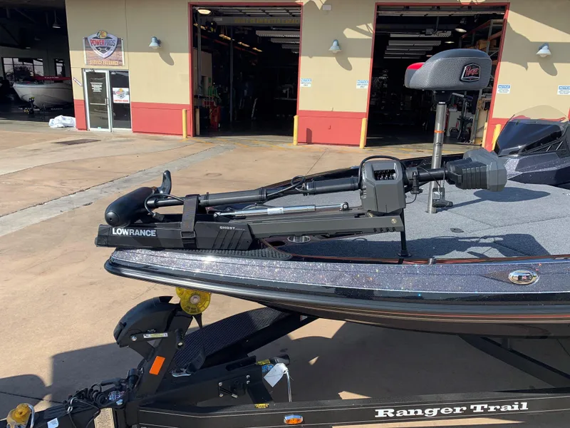 Slide: The Image of 2024 Ranger Z519 Ranger Cup Equipped boat with Lowrance equipment on trailer. - 2